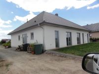 06.-Neubau-Einfamilienhaus-mit-Aussenanlagen-in-Bad-Lgs.-Rueckansicht